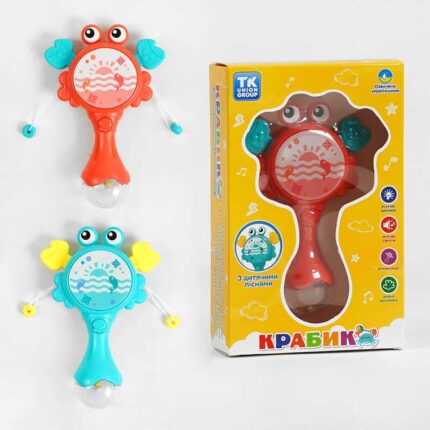Музичне брязкальце "Крабик" ТК 82855 (108) "TK Group", ОЗВУЧУВАННЯ УКРАЇНСЬКОЮ МОВОЮ, світло, диско-куля, звук, мелодії, брязкальце, прорізувач, колотушка, в коробці